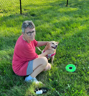 Susie Heffron and Arabella enjoying the Dog Park cropped resized.jpg